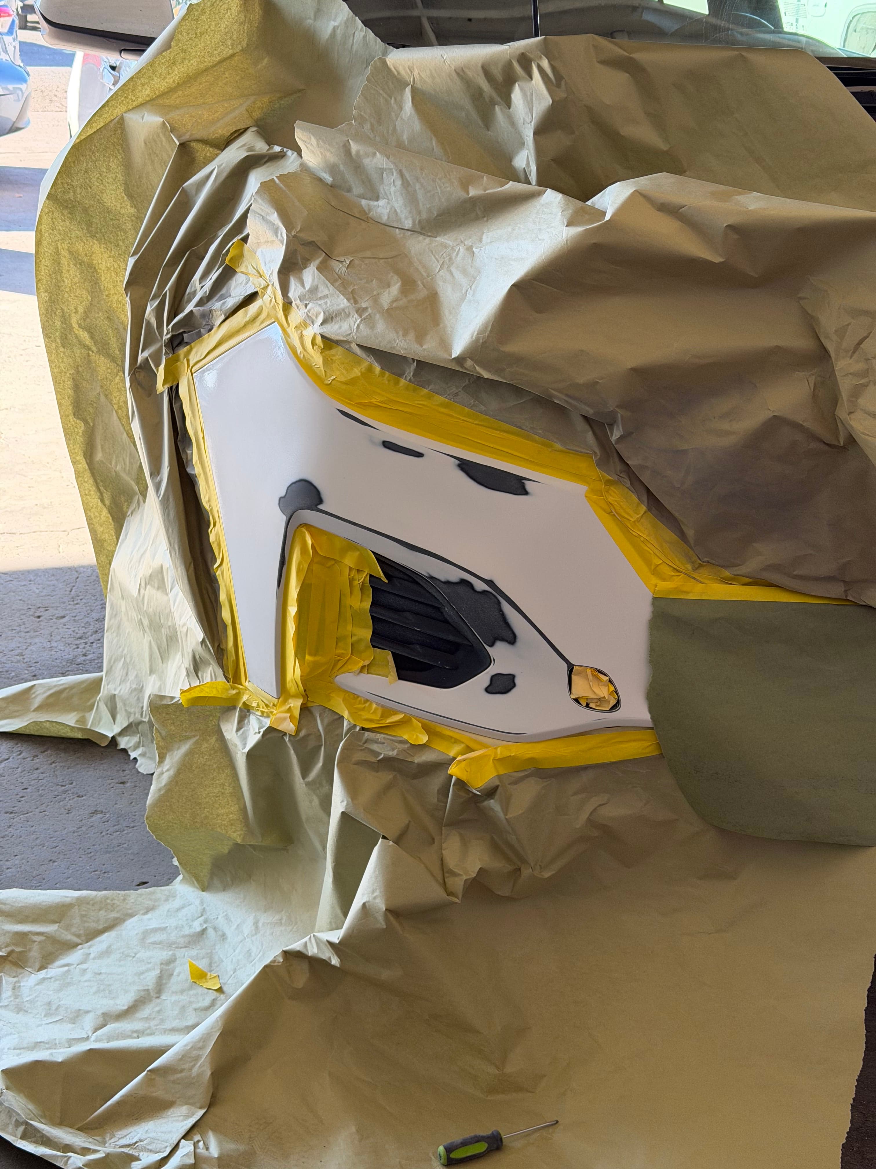 Rear bumper masked off for spot paint repair at D&S Auto Repair in Vallejo, CA